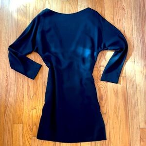 Vintage black cocktail dress with low back